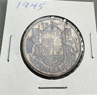 Reverse of 1945 Canadian 50-cent coin in holder