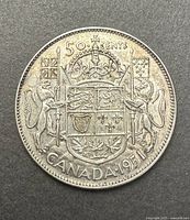 Reverse showing Canadian coat of arms and date 1951