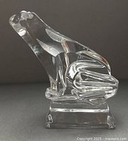 Left-side view of clear crystal frog paperweight showing art deco styling and pedestal base