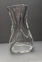 Full view of clear twisted crystal vase front