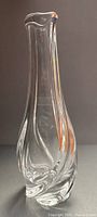Full profile view of clear crystal bud vase