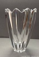 Front view showing entire vase and scalloped rim