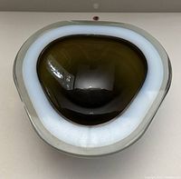 Top view showing dark olive interior and white band