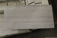 Single porcelain tile showing colour and finish