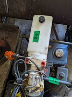 Overall view of power unit showing motor, manifold, reservoir, pendant and wiring