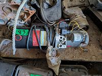 Top view of the complete Hydro-Tek power unit showing motor, pump, manifold, wiring and overall wear