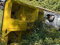 Pedal boat underside showing yellow deck and internal pedal mechanisms
