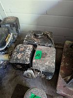 Top view of dusty Powerfist engine showing fuel tank and blower housing