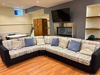 Entire sectional assembled with pillows visible