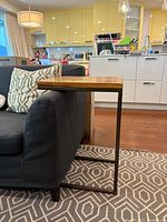 Side view of table beside sofa