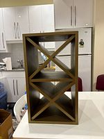 Front view showing X-shaped interior dividers