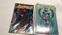 Two bagged Ascension comics with armored characters on covers
