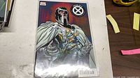 Front cover of House of X #5 variant comic in bag and board
