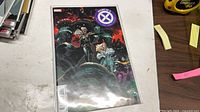 Front cover of House of X #6 comic in bag and board