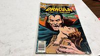 Front cover of The Tomb of Dracula #48 comic showing title, price, issue number and artwork