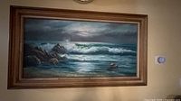Full view of framed coastal seascape painting