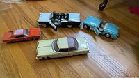 All four die-cast models on floor