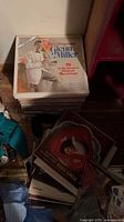 Stack of records topped by Glenn Miller Reader’s Digest box set with additional albums underneath.