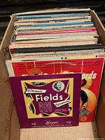Box filled with numerous LP records, front record Gracie Fields "Souvenir"