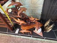 Group shot showing all dolphin decor pieces on hearth