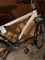 Close-up of frame with Mikado branding and drivetrain