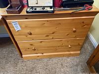 Front view of pine two-drawer filing cabinet