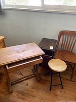 group shot of desk, magazine table, chair, stool