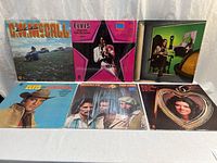 All six LPs displayed front covers