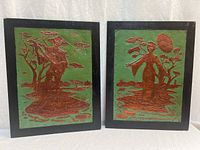 Both framed copper laminate panels side by side