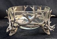 Front view showing glass bowl and pewter deer antler base