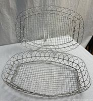 Both wire baskets upright to show overall design and condition