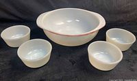 Full group view of mixing bowl and four custard cups