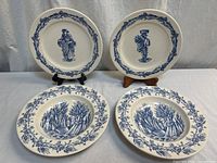 All four pieces front view showing motifs and border