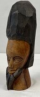 Full view of carved wooden bust front left