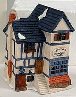 Front view of Jones & Co Brush and Basket porcelain building