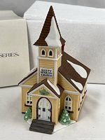 Front view of Sleepy Hollow Church figurine with original box behind