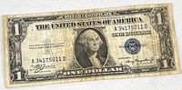 Front view of the 1935A $1 silver certificate showing full design and wear