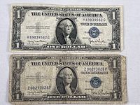 Fronts of both 1935D $1 silver certificates