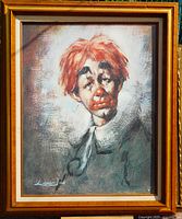 Full view of framed clown portrait, showing frame and image