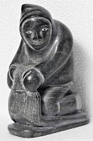 Front view of soapstone hunter sculpture