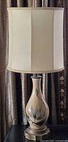 Full view of lamp with shade showing overall appearance and height