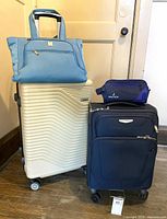 Group shot showing all four luggage items together