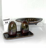 front view of ashtray and salt & pepper set on tray