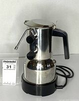 Full view of stainless steel electric espresso machine front angle
