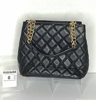 Front view showing quilted pattern, overall condition