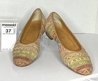 Angled front view of both shoes showing multicolour design and toes