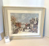 Front view of framed Maurice Utrillo print with mat and frame visible