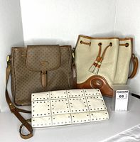 Front view of all three purses together