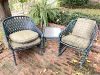 Two chairs and table showing overall condition and design