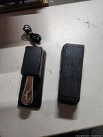 Top view of both pedals showing size, design, and cable